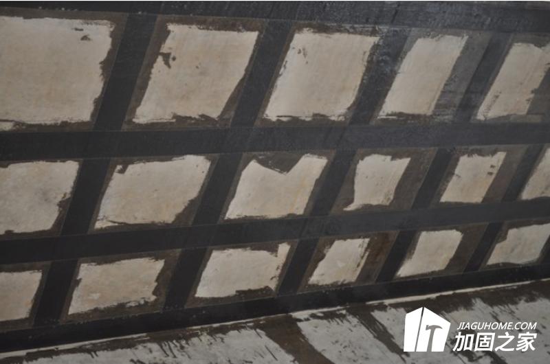 碳纖維布粘貼工程施工規(guī)定對碳纖維布的鋼筋搭接與斷開