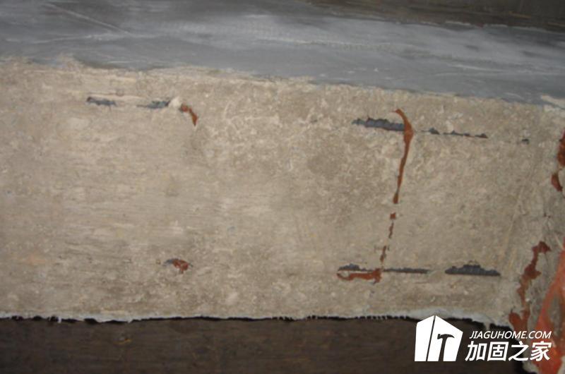 梁、柱端受拉鋼筋受壓區(qū)混凝土后被壓碎